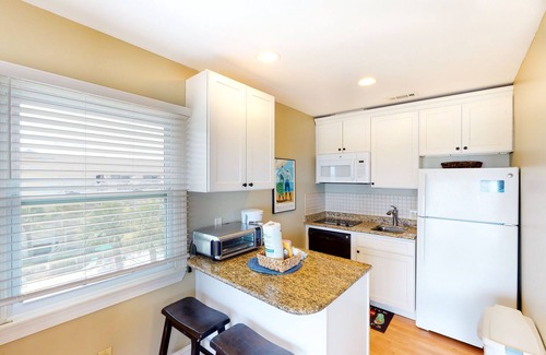 North Forest Beach Condo | Charming coastal retreat with beach access, private balcony, & pool - near golf