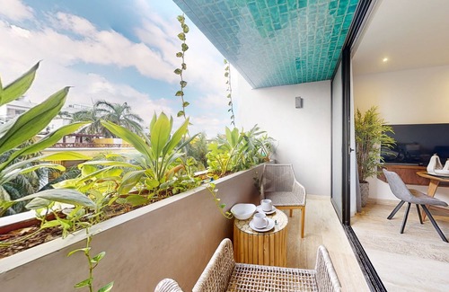Gonzalo Guerrero Condo | Charming condo with rooftop pool, scenic balcony, & kitchenette