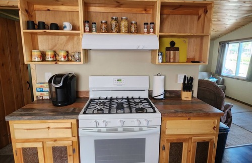 Kalkaska Cottage | Charming Cottage Retreat - Your Home Away from Home!
