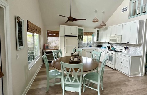 Anna Maria House | Charming cottage with heated pool, tropical landscaping in prime location.