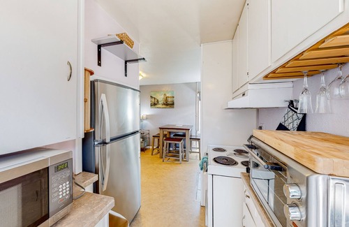 West Slope Cottage | Charming cottage with a private hot tub, gas grill, & furnished patio
