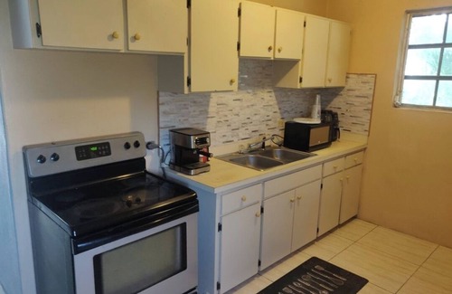 Nassau Apartment | Charming family friendly home,furnished with parking facilities,near malls/beach