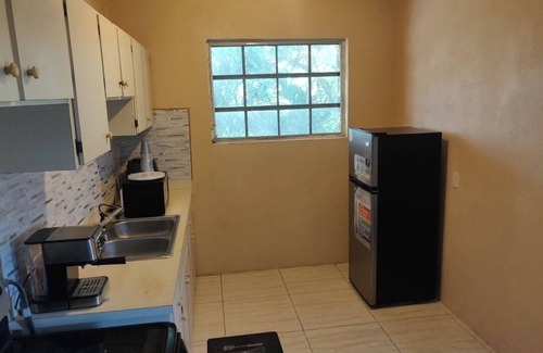 Nassau Apartment | Charming family friendly home,furnished with parking facilities,near malls/beach
