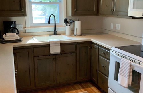 Ellison Bay Cottage | Charming garden cottage downtown Ellison Bay walking distance to lake and shops
