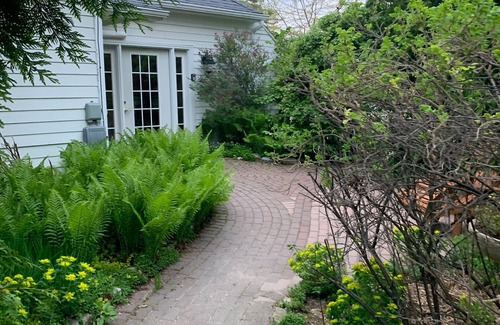 Ellison Bay Cottage | Charming garden cottage downtown Ellison Bay walking distance to lake and shops