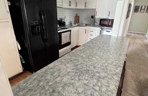 Eagle River Condo | Charming hillside duplex with plenty of space