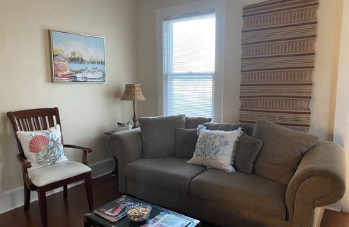 Polk City Cottage | Charming Historic Cottage with Cozy Porch and Garden Retreat