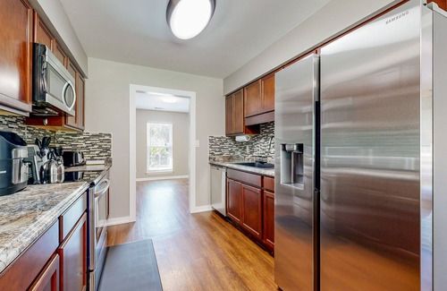 Rincon House | Charming home with large yard, fire pit, AC close to Outlet Mall and Airport