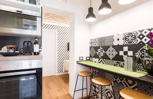 Trastevere Apartment | Charming house for 5 in Trastevere overlooking medieval church: 3 bathrooms, WiFi,AC