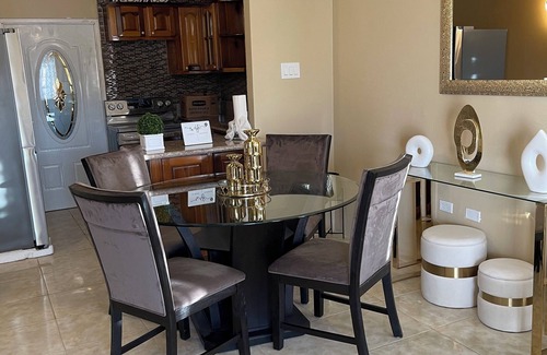 Florence Hall Village House | Charming family friendly 2-bedroom house in StoneBrook Estate with WiFi, AC