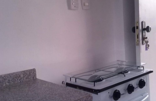 Pitangueiras Apartment | Charming kitnet ideal for couple 100 meters from the beach in Pitangueiras