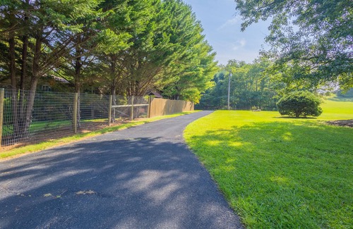Ingles House | Charming lakefront retreat with cozy interiors, private dock, fire pit, and breathtaking water view