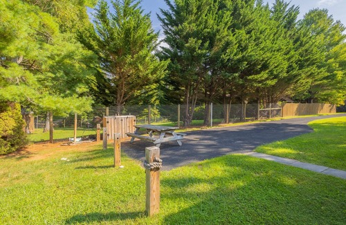 Ingles House | Charming lakefront retreat with cozy interiors, private dock, fire pit, and breathtaking water view