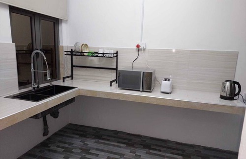 Rodrigues Island Apartment | Charming large ensuite room with fully equipped kitchenette + terrace. 4 Persons