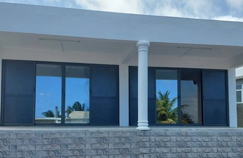 Rodrigues Island Apartment | Charming large ensuite room with fully equipped kitchenette + terrace. 4 Persons