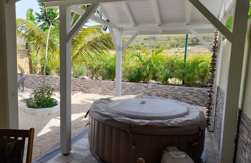 Sainte-Anne House | Charming little detached house with private garden and Jacuzzi