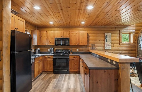 Boyne City Ski Chalet | Charming Log Cabin Just Steps from the Slopes at Boyne Mountain