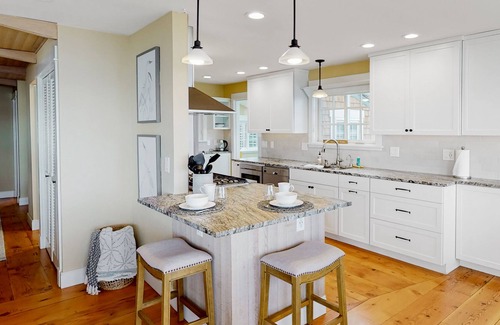 Rollingbay House | Charming oceanfront home with firepit, deck, beach access, deck, & W/D