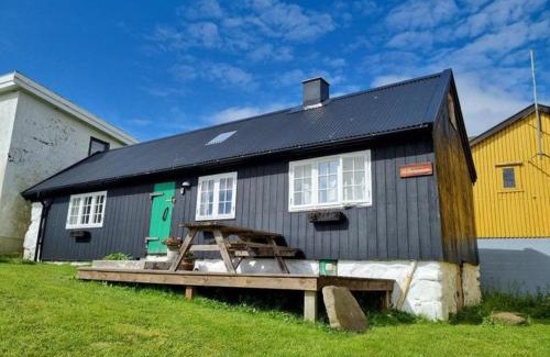 Hvalba House | Charming old style shanty