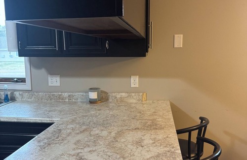 Cadott House | Charming pet friendly cozy hideaway with private backyard.