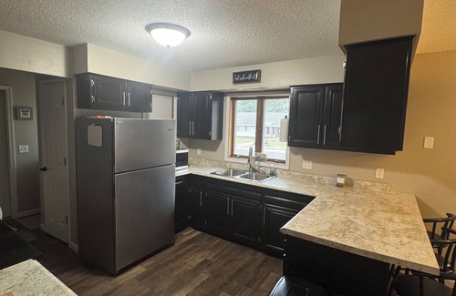Cadott House | Charming pet friendly cozy hideaway with private backyard.