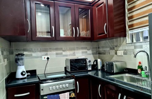 Adenta Apartment | Charming, Quiet & Cozy - Close to Highway,Parking