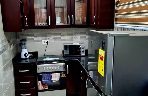 Adenta Apartment | Charming, Quiet & Cozy - Close to Highway,Parking