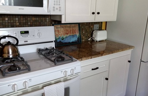 Marine Terrace House | Charming Remodeled Single Level. HotTub. Fenced backyard. Porch view!