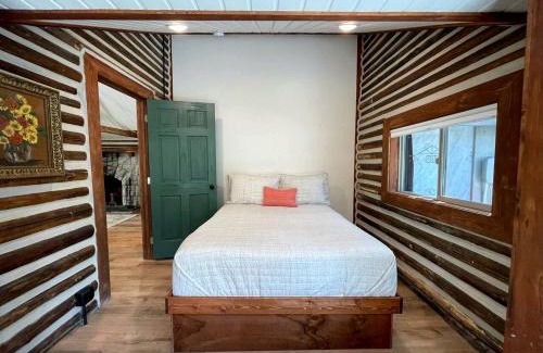 Island Park House | Charming Riverfront Cabin with Hot Tub and Dock Access Near Scenic Trails in Island Park, Idaho