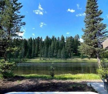 Island Park House | Charming Riverfront Cabin with Hot Tub and Dock Access Near Scenic Trails in Island Park, Idaho