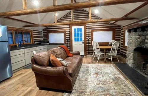 Island Park House | Charming Riverfront Cabin with Hot Tub and Dock Access Near Scenic Trails in Island Park, Idaho