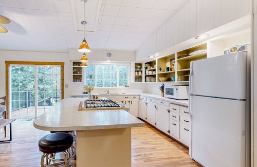 Joseph House | Charming riverfront home with fireplace, patio, grill, & full kitchen