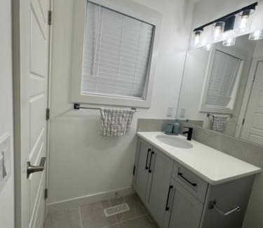 Airdrie House | Charming room with amenities
