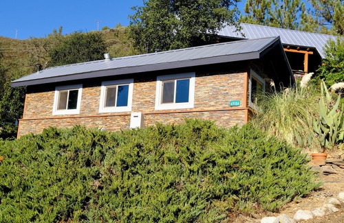 Midpines Cabin | Charming stone clad cabin with views off Highway 140 towards Yosemite