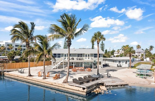 Orlando Beach Condo | Charming Studio Suite- Steps from Private Beach Access, Fire Pit, & BBQ Grills
