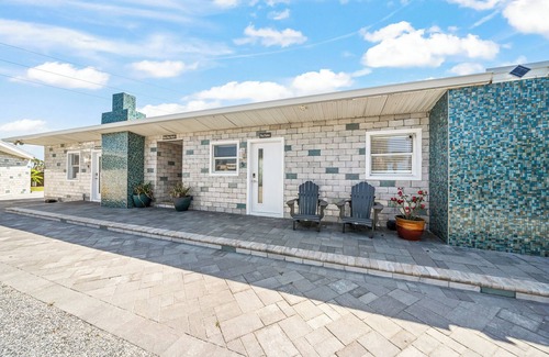 Orlando Beach Condo | Charming Studio Suite- Steps from Private Beach Access, Fire Pit, & BBQ Grills