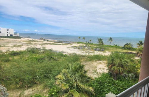 Crystal Harbour Apartment | Charming Suite w/Full Kitchen, Ocean Views & Pool, Ideal for Family Getaways