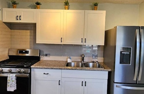 Estate Peters Rest House | Charming Sunny Isle Escape, Private Patio, Office and Smart TVs in Every Room!