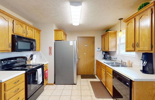Brookline Station House | Charming townhome with private deck, w/d, central air & close to attractions
