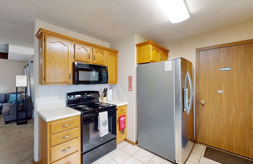 Brookline Station House | Charming townhome with private deck, w/d, central air & close to attractions