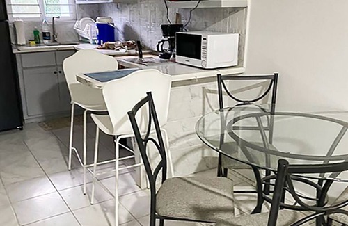 Hellshire Apartment | Charming tropical beach retreat Suite 1