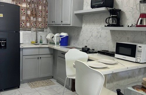 Hellshire Apartment | Charming tropical beach retreat Suite 1