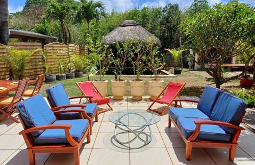 Calodyne Villa | Charming Tropical Villa pool & garden