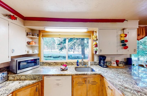 Joseph House | Charming Wallowa Lake home with forest views, fireplace, & private W/D