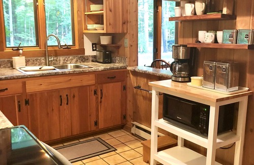 Harbert House | Charming year round cottage with large PRIVATE beach in the peaceful woods