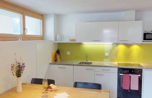 Tschlin Apartment | Chasa Samalgors: Modern and family-friendly 3-room apartment in the idyllic mountain village of Tschlin