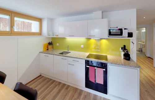 Tschlin Apartment | Chasa Samalgors: Modern and family-friendly 3-room apartment in the idyllic mountain village of Tschlin