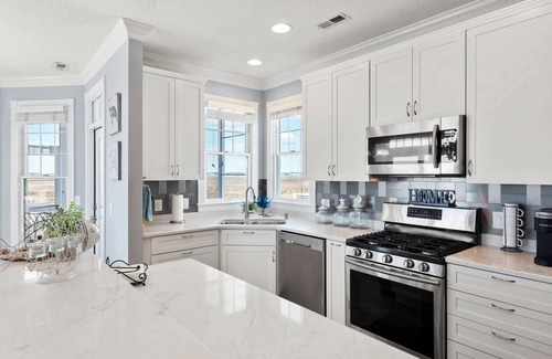 Manteo House | Chasing Tides: Canalfront, Boat Slip, Water Views