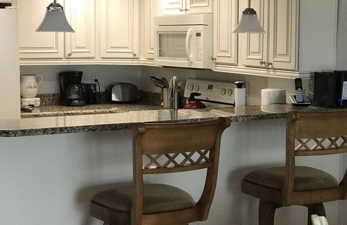 Indian Shores Condo | Chateaux #406 Charming Beachfront Retreat with spectacular views!
