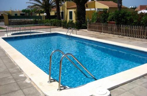 Cap d'Artrutx Apartment | Cheap apartment with a sunny garden in Menorca